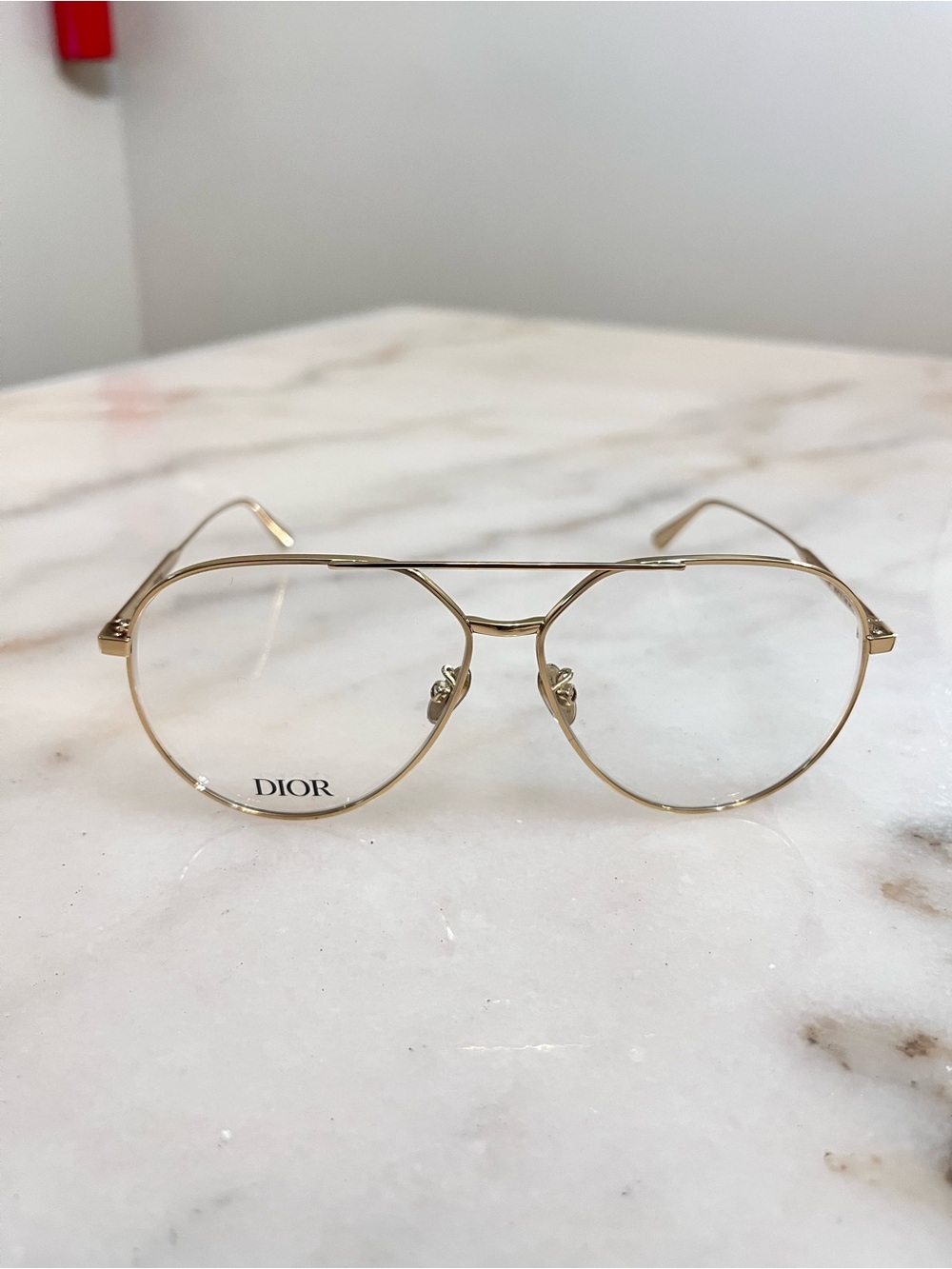 Eyeglasses on Marble Surface